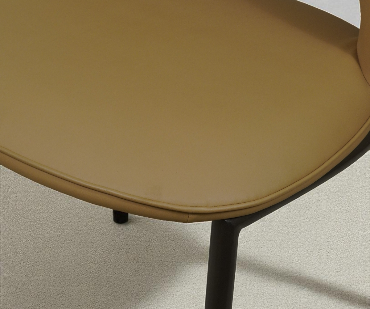 Dining chair 087 B, front view in tan with a cut-out curved back
