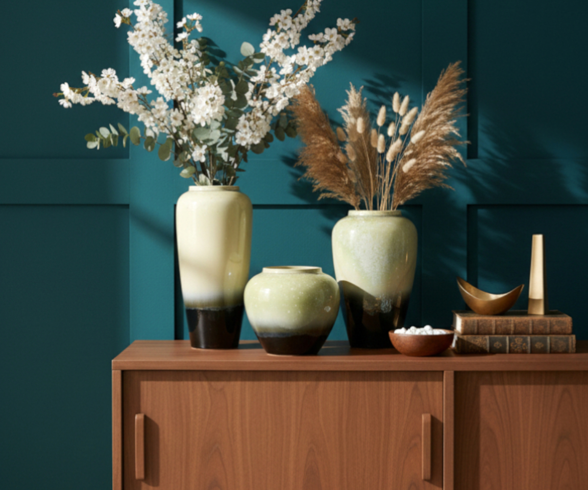 Elegant cream black vase A865, styled with dried stems on a walnut sideboard