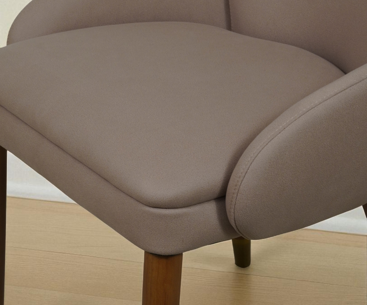 Eleganza taupe velvet 111, angled view beside a linen curtain