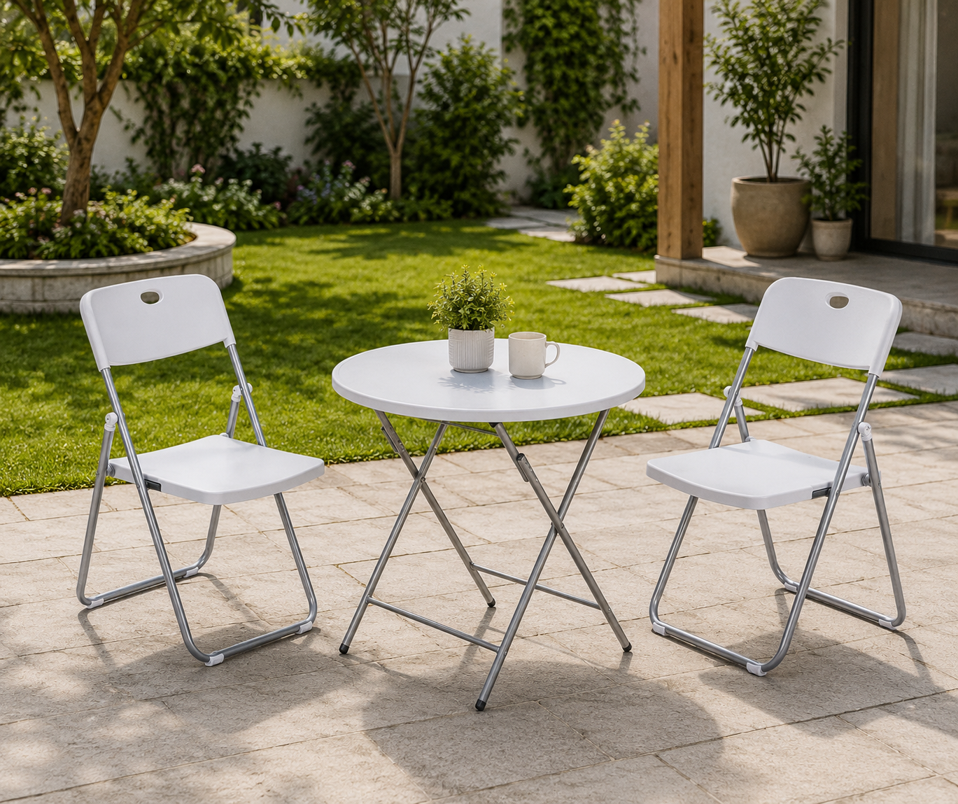FANAR white folding chair 3017, folding set on a paved garden patio