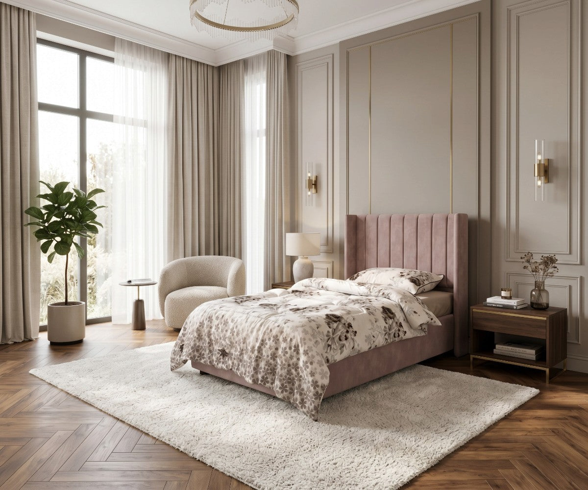 Dusty rose upholstered bed frame from Furniture Factory Outlet featuring a tall wingback headboard with vertical channel tufting. Mattress and bedding not included