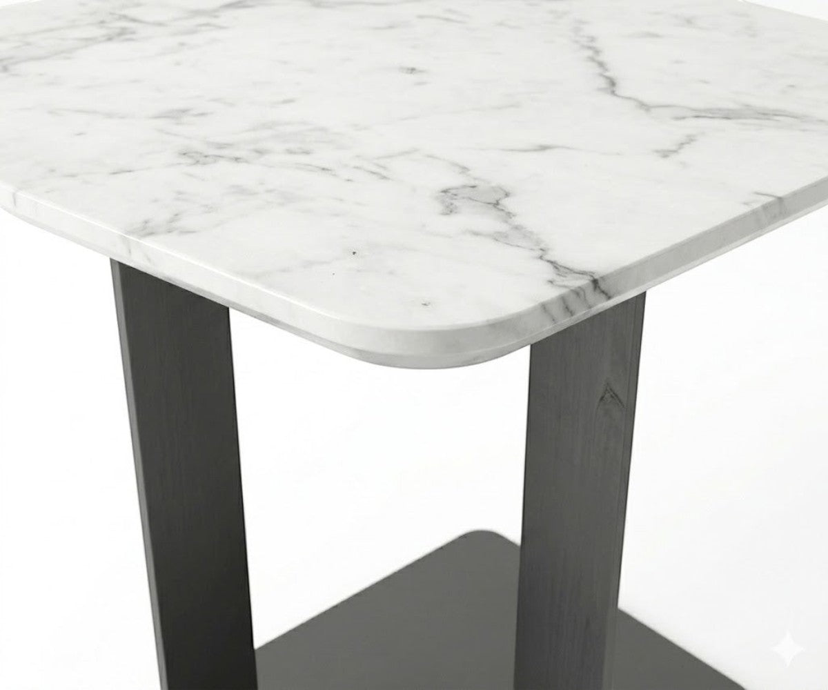 G63# silver glass table beside a sofa in a bright living room