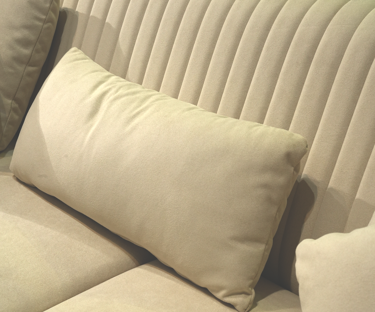 GISELLE cream ribbed sofa set in a bright panelled living room