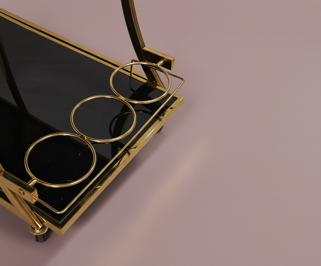 GLASS TROLLEY DC1006, angled view with brass rails and smoked glass shelves