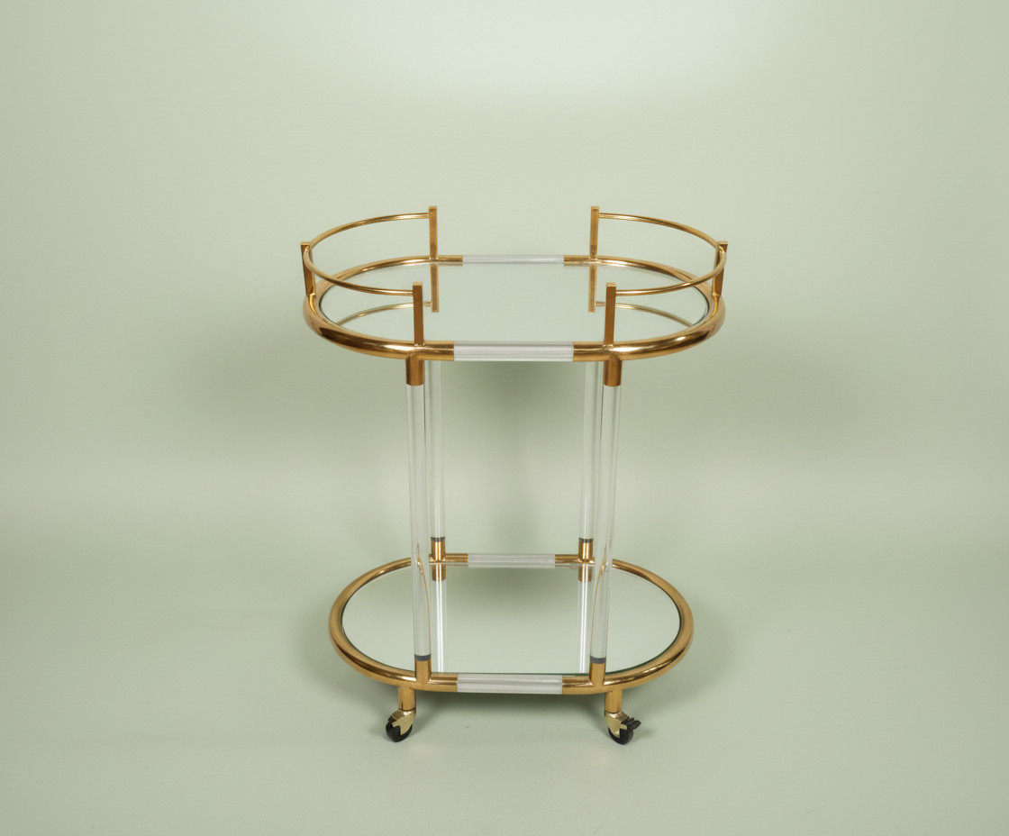GLASS TROLLEY DC1017, front view of an oval cart with a brass gallery rail