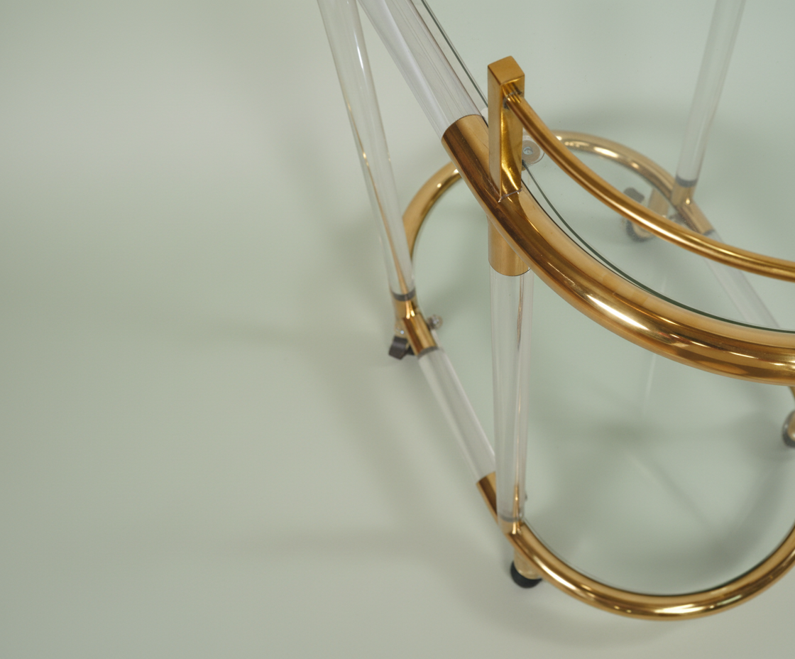 GLASS TROLLEY DC1017, front view of an oval cart with a brass gallery rail
