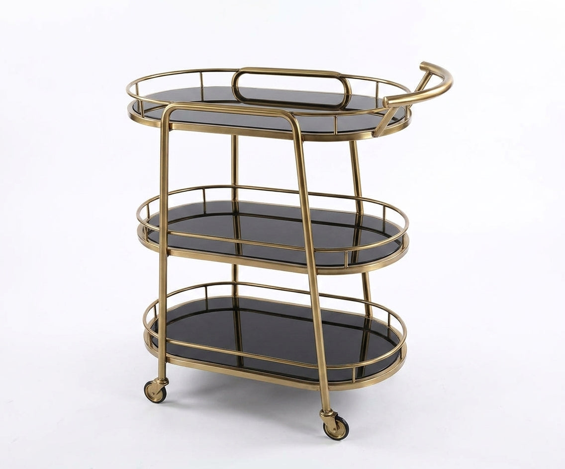 GLASS TROLLEY DC1027# in a city-view lounge beside a green velvet armchair
