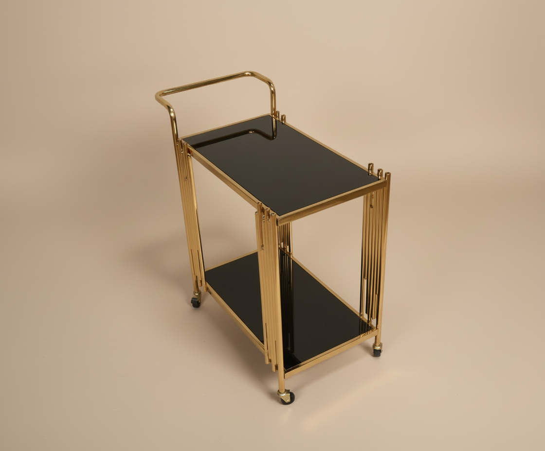 GLASS TROLLEY DC1039, angled view with black glass shelves and fluted brass legs