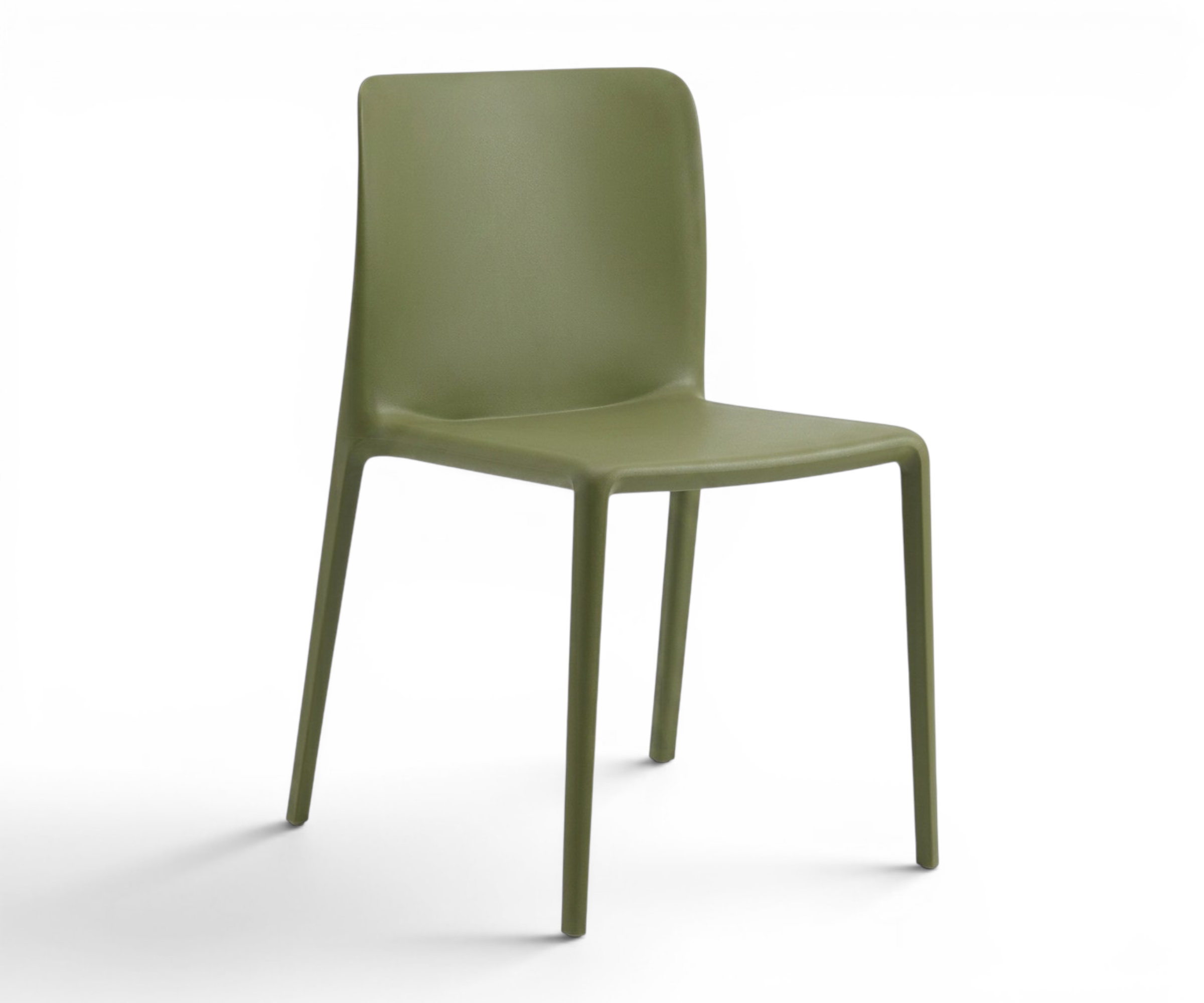 GREEN A650 plastic chair around a walnut table in a city-view dining room