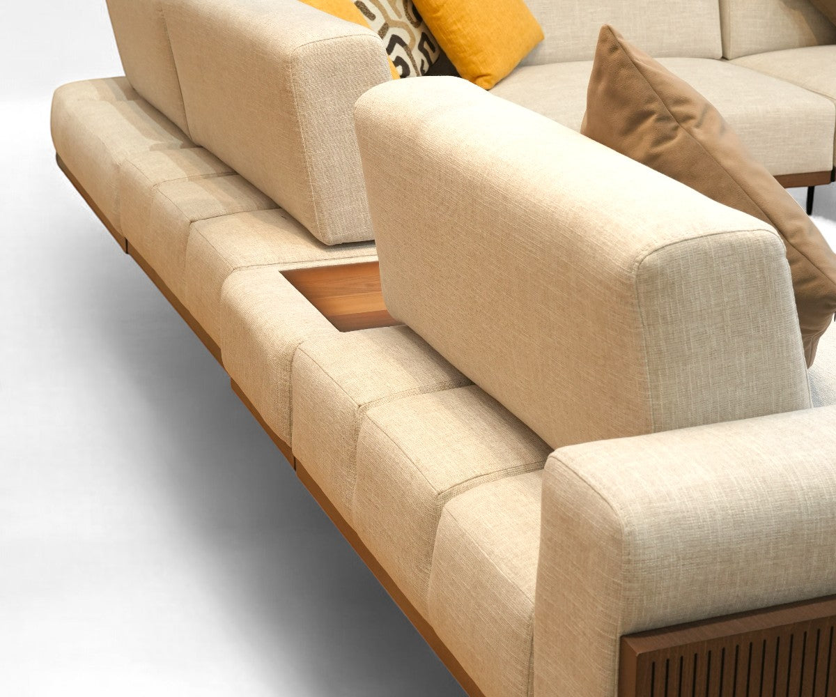 HARMONY beige teak corner sofa in a bright garden-view living room
