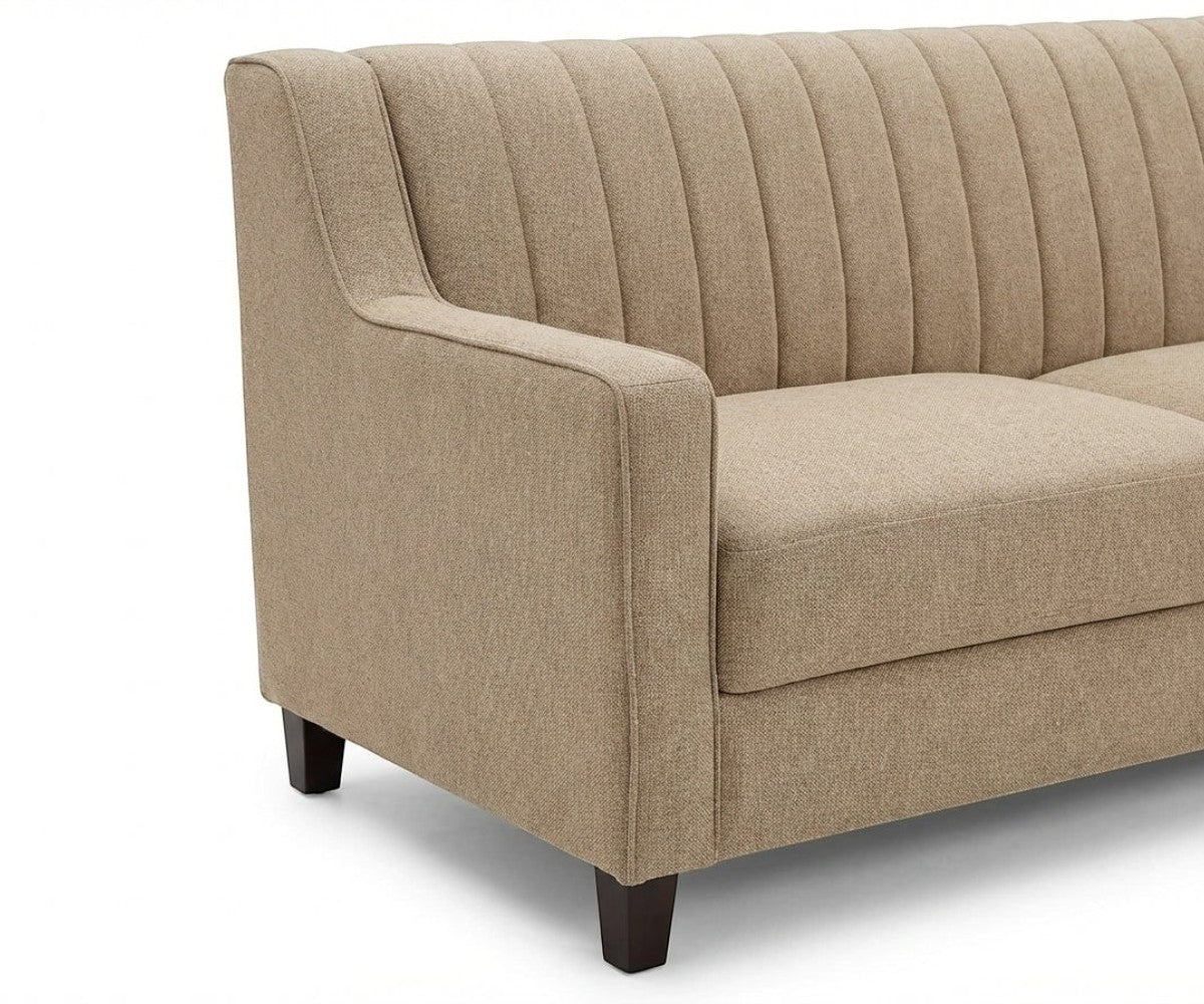 Impex beige velvet sofa set in a chandelier-lit panelled living room