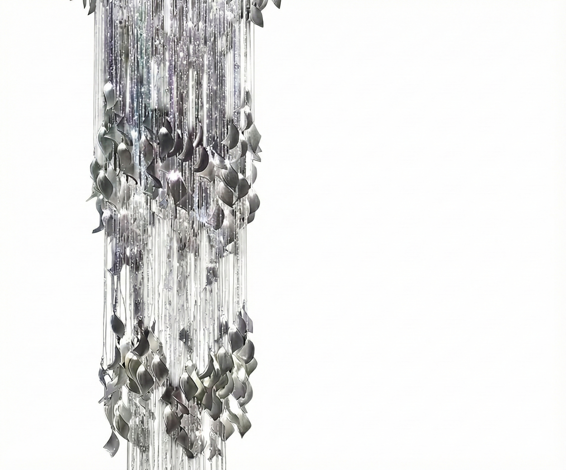 Lights in Qatar radiant silver cascade chandelier in a double-height dining room