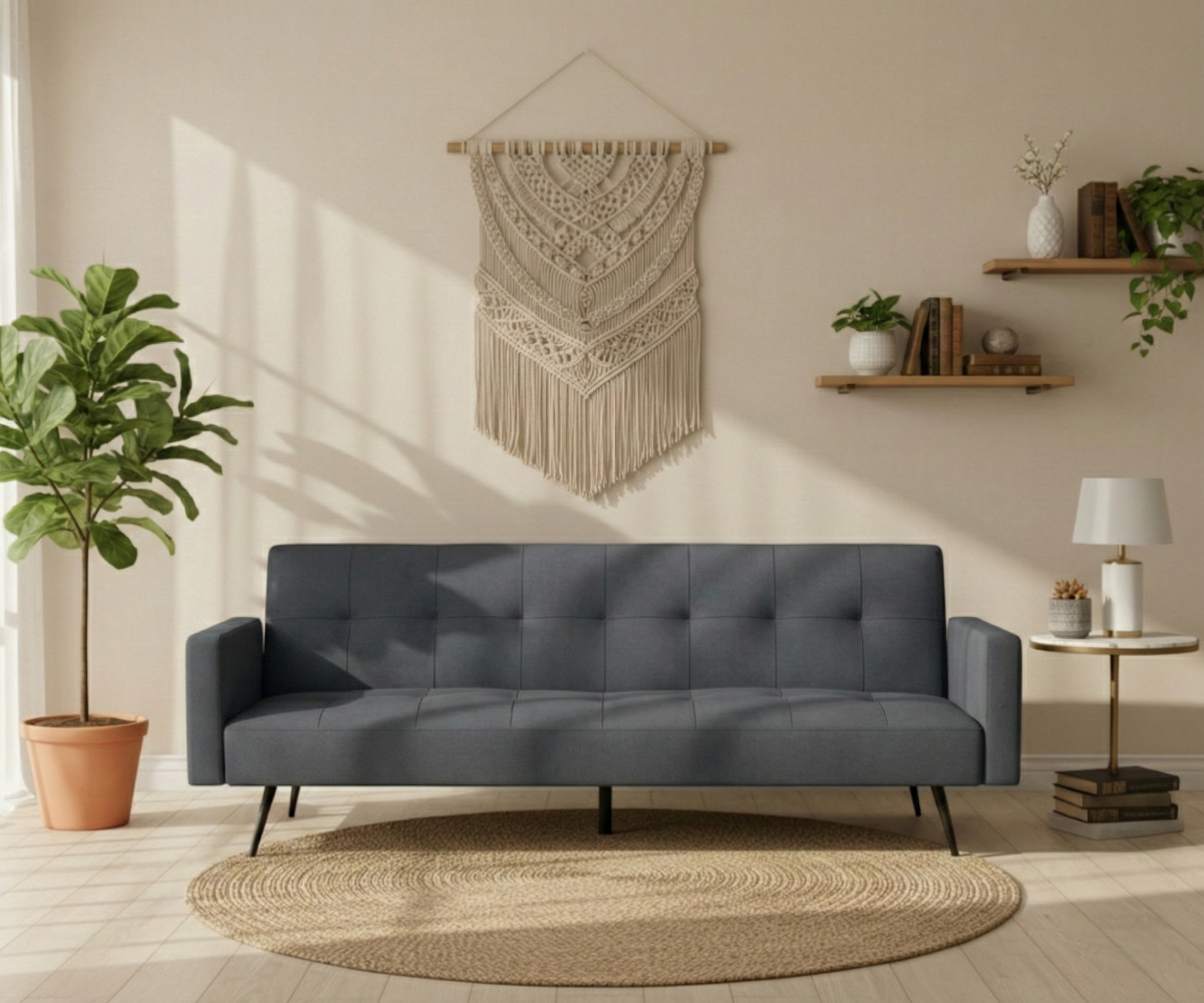 LV3785 charcoal click-clack sofa against a cream wall with a macrame hanging