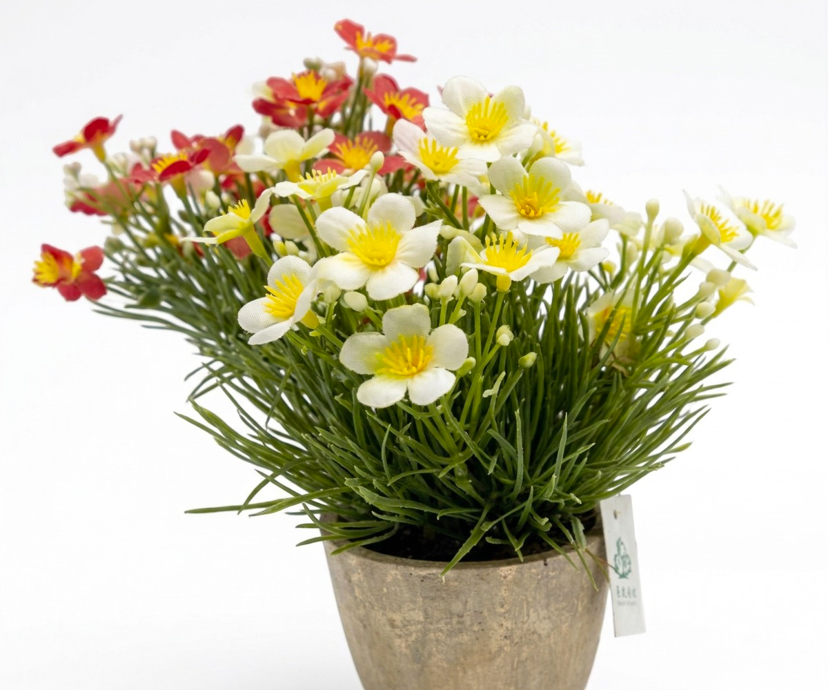 Lyra Pink Bloom mini pot, artificial white daisies in a small stone pot