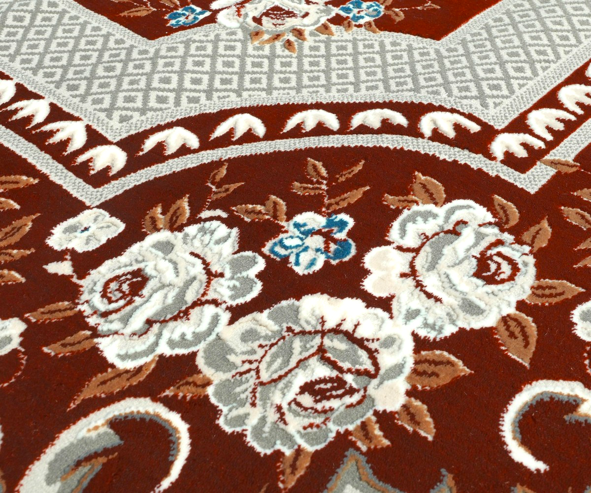 MAJESTIC crimson heritage rug, 250x350 cm, in a city-view majlis