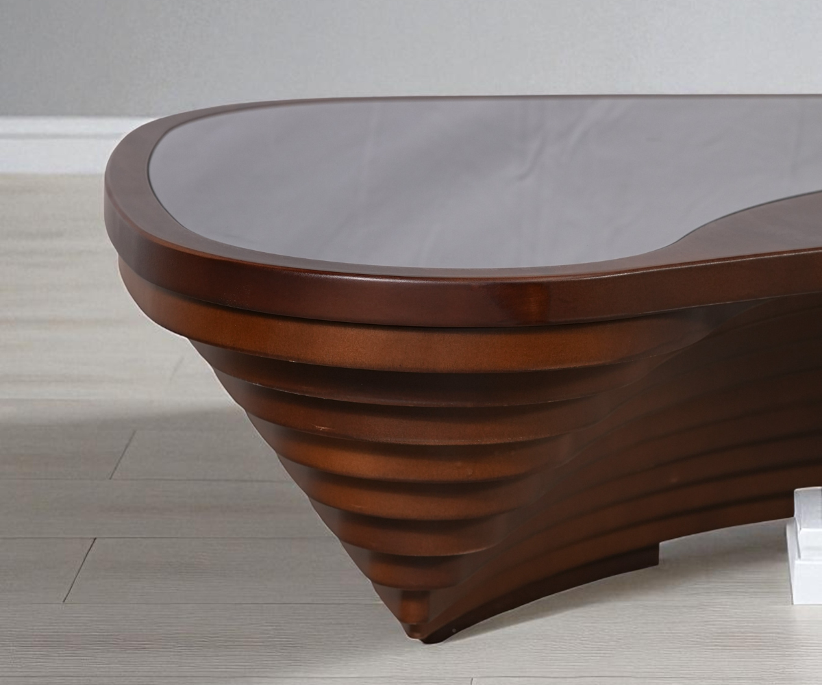 Maran organic wood table, front view with a kidney-shaped walnut top