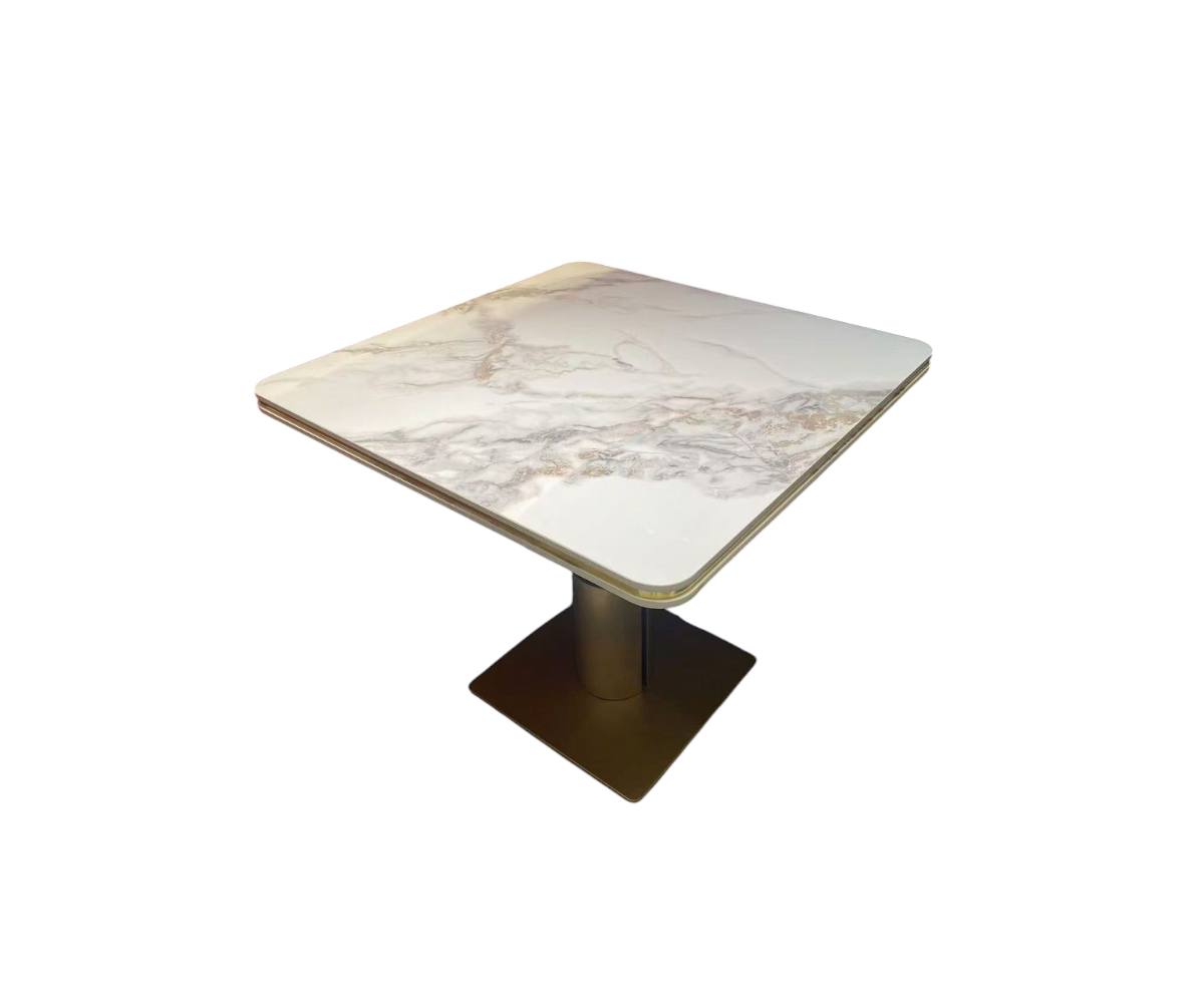Marble bistro table in a marble-clad city-view lounge beside an armchair