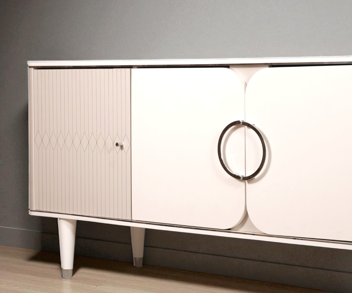 MARMO white cabinet console beneath a wall light in a bright room
