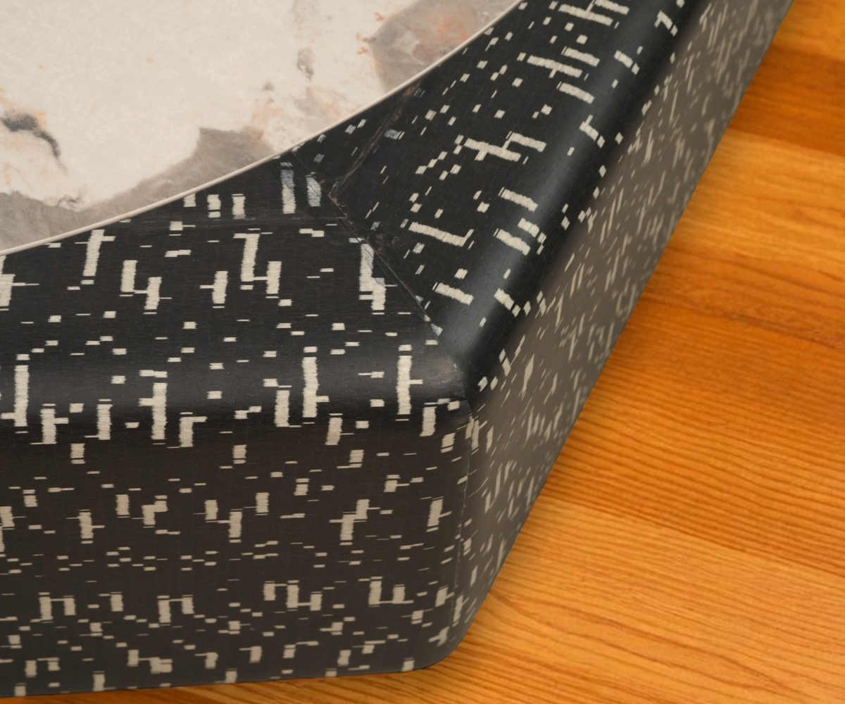 Matrix 2586# hexagonal marble table in a warm-lit marble living room