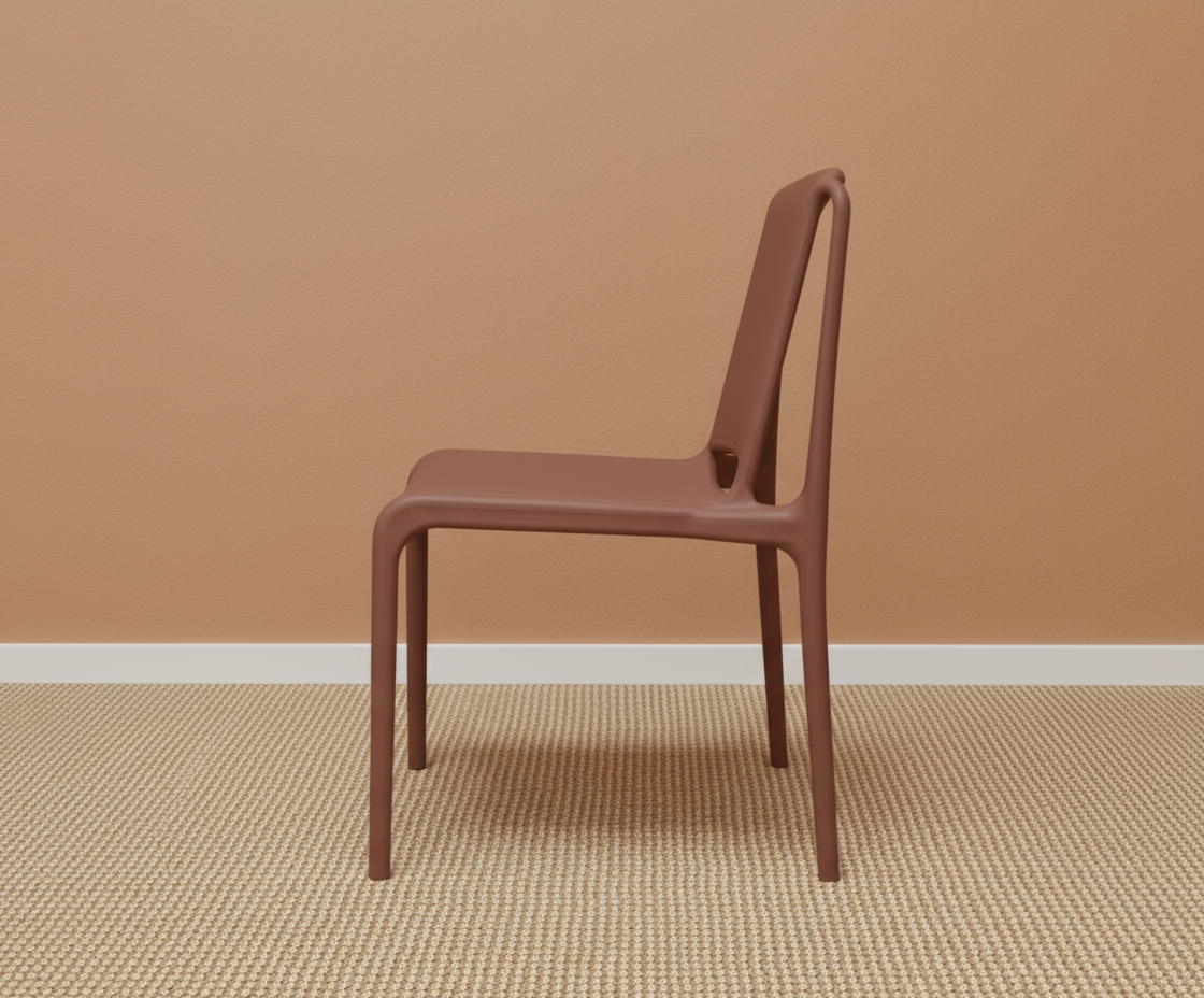 Minimalist designer side chair 1799 in rust, angled view on a woven rug