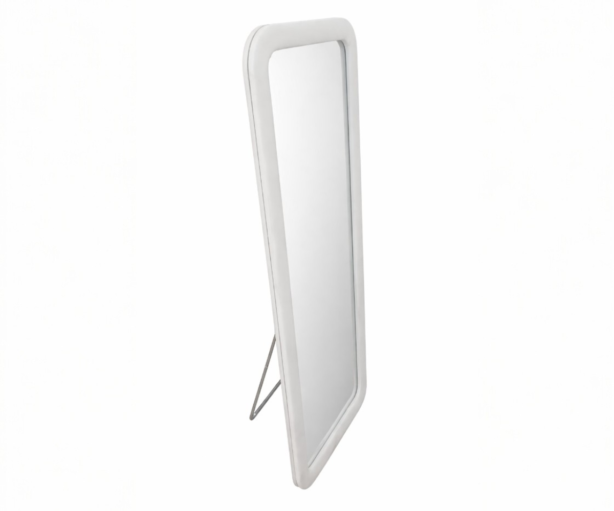 Minimalist floor mirror in a fluted-panel dressing room with a city view