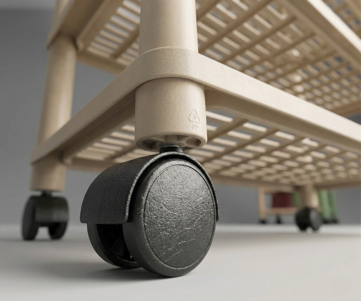 Multi tier shoe storage rack, close-up of a castor beneath the slatted shelf