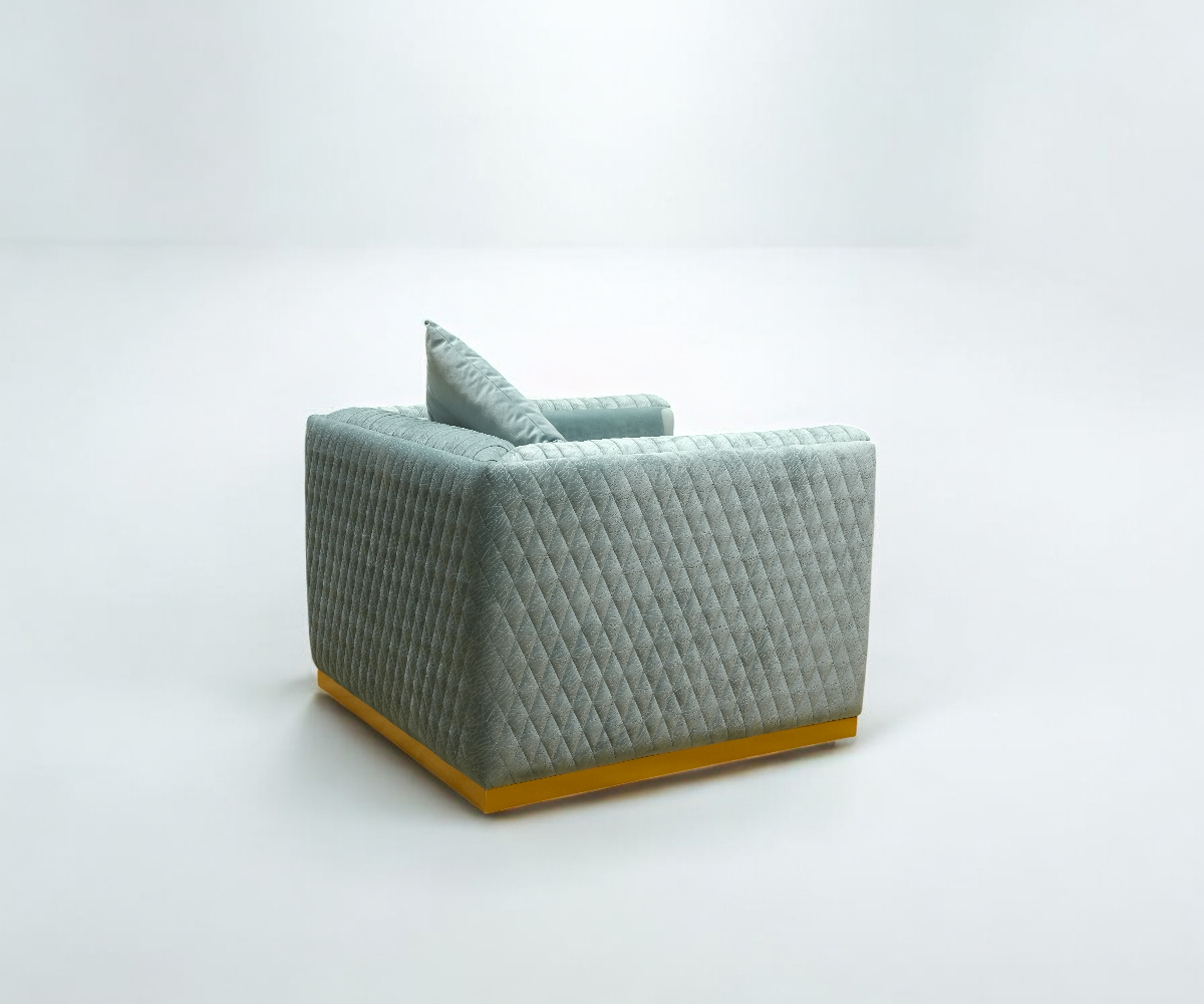 NAPOLEAN grey velvet sofa set in a bright panelled room with a fireplace