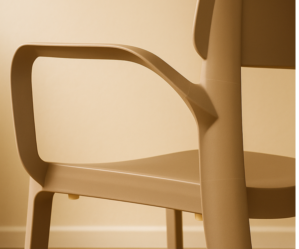 NVS-020-04 modern designer armchair in taupe, angled view on a wood floor