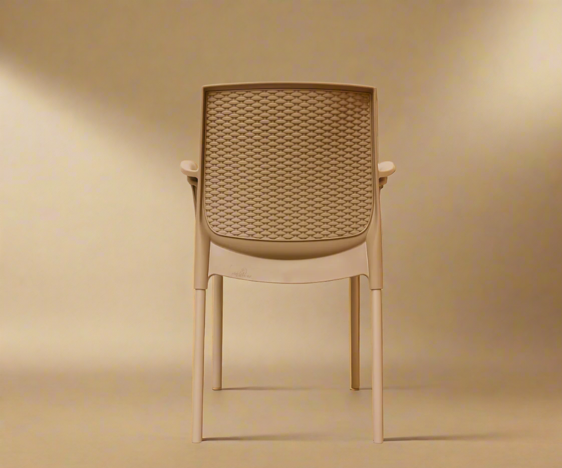 NVS-030-09 rattan-inspired modern armchair, angled view in sand