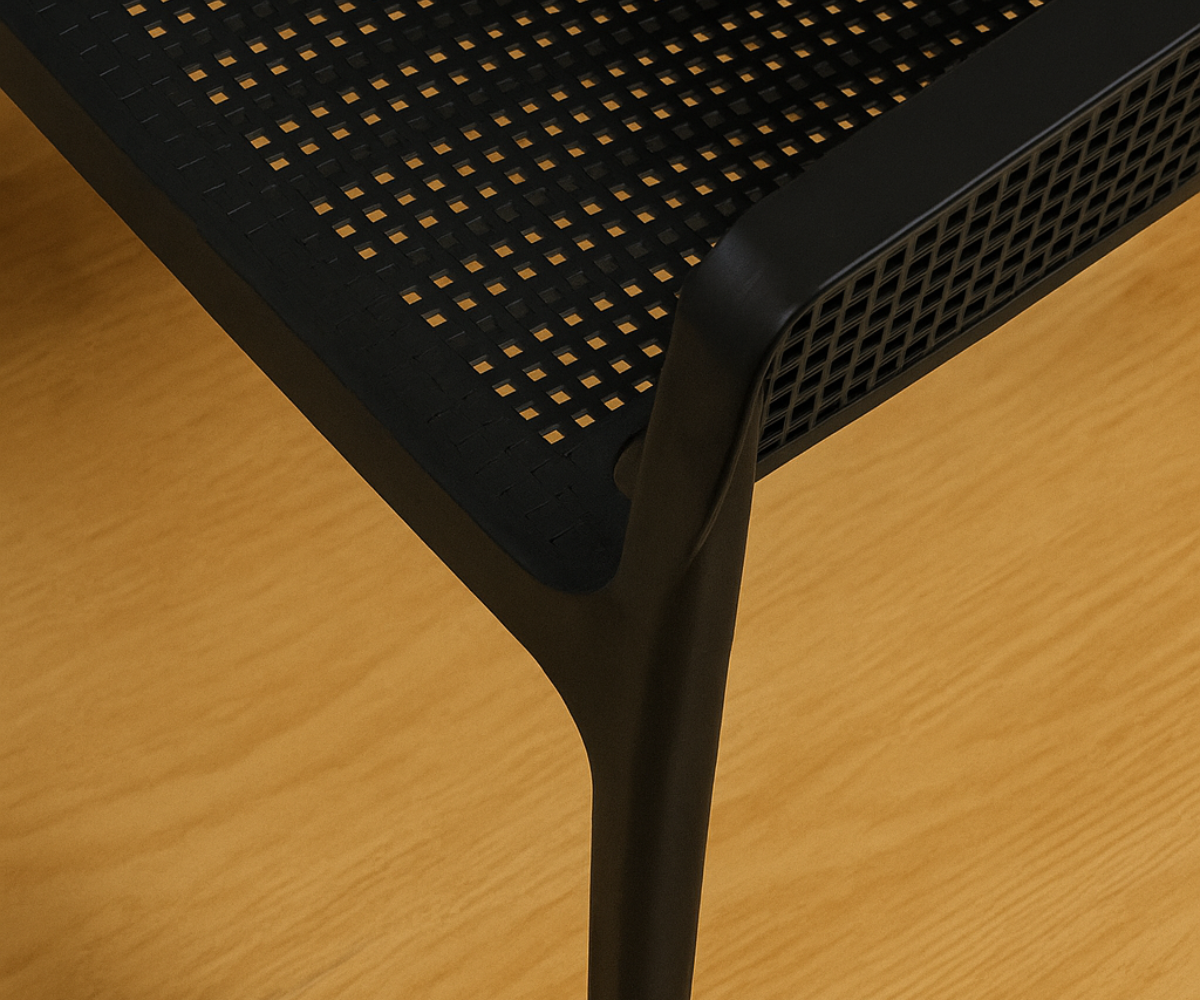 NVS-085-02 modern designer armchair in black, front view with a mesh back