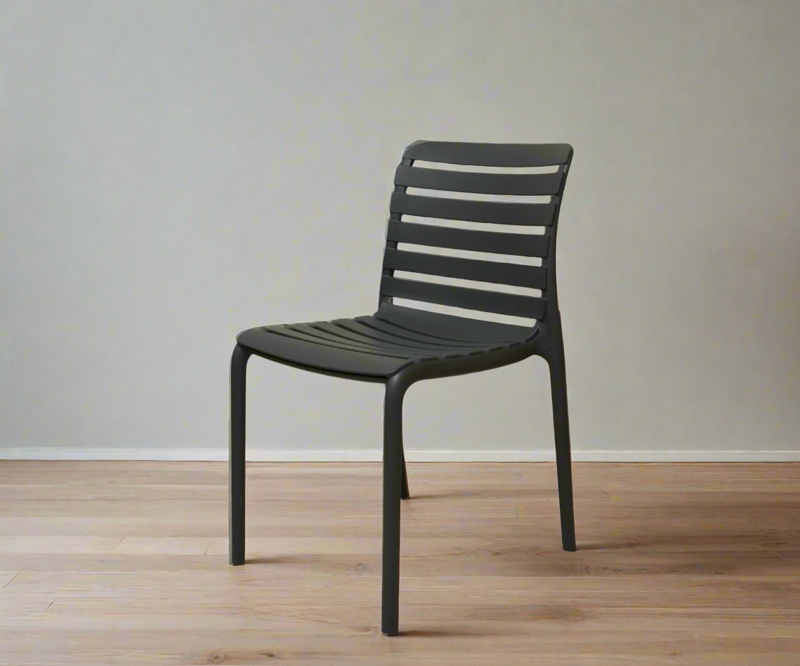 NVS-088-01 modern slatted side chair in black, angled view on a wood floor