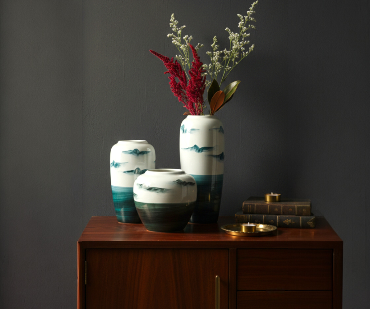 Ocean tone table vase A936, styled with dried stems on a walnut cabinet
