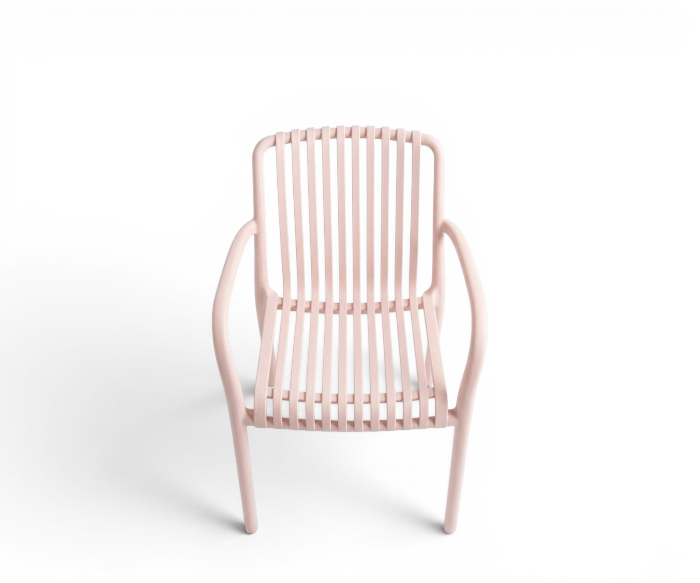 Plastic PP chair 7102 light pink, at a round table in a city-view apartment