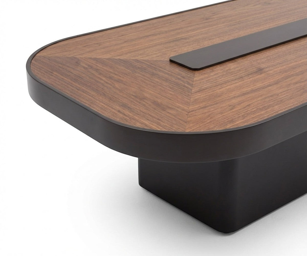 Platinum walnut center table in a bright city-view living room
