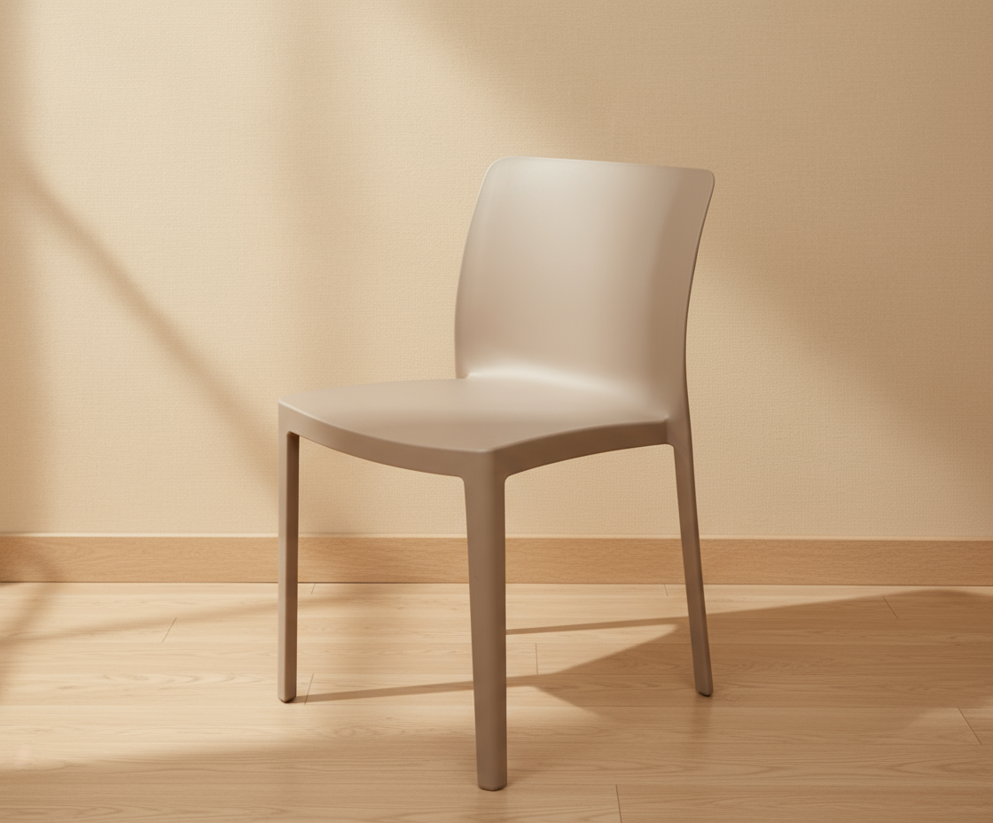 PP chair 857 in taupe, angled view on a light wood floor