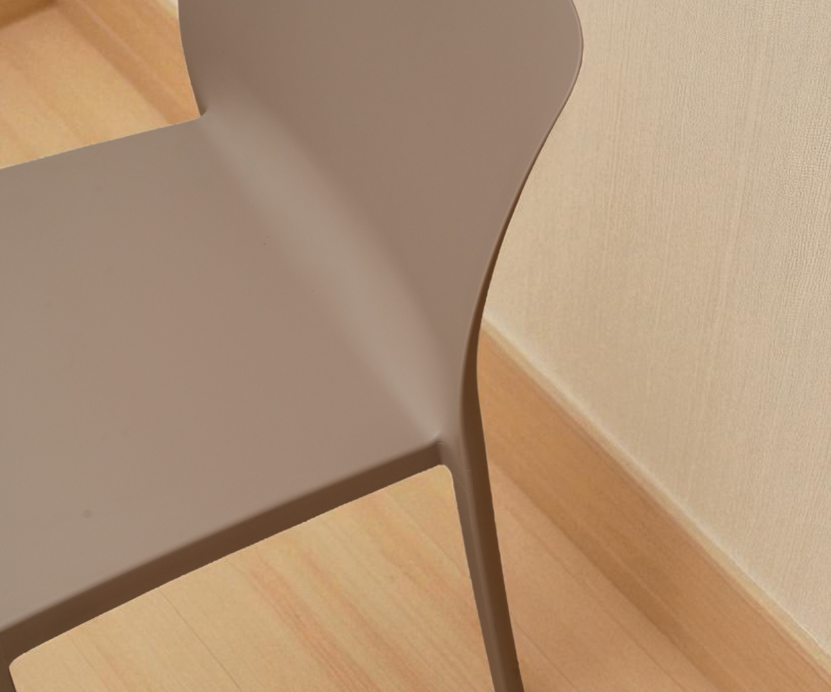 PP chair 857 in taupe, angled view on a light wood floor