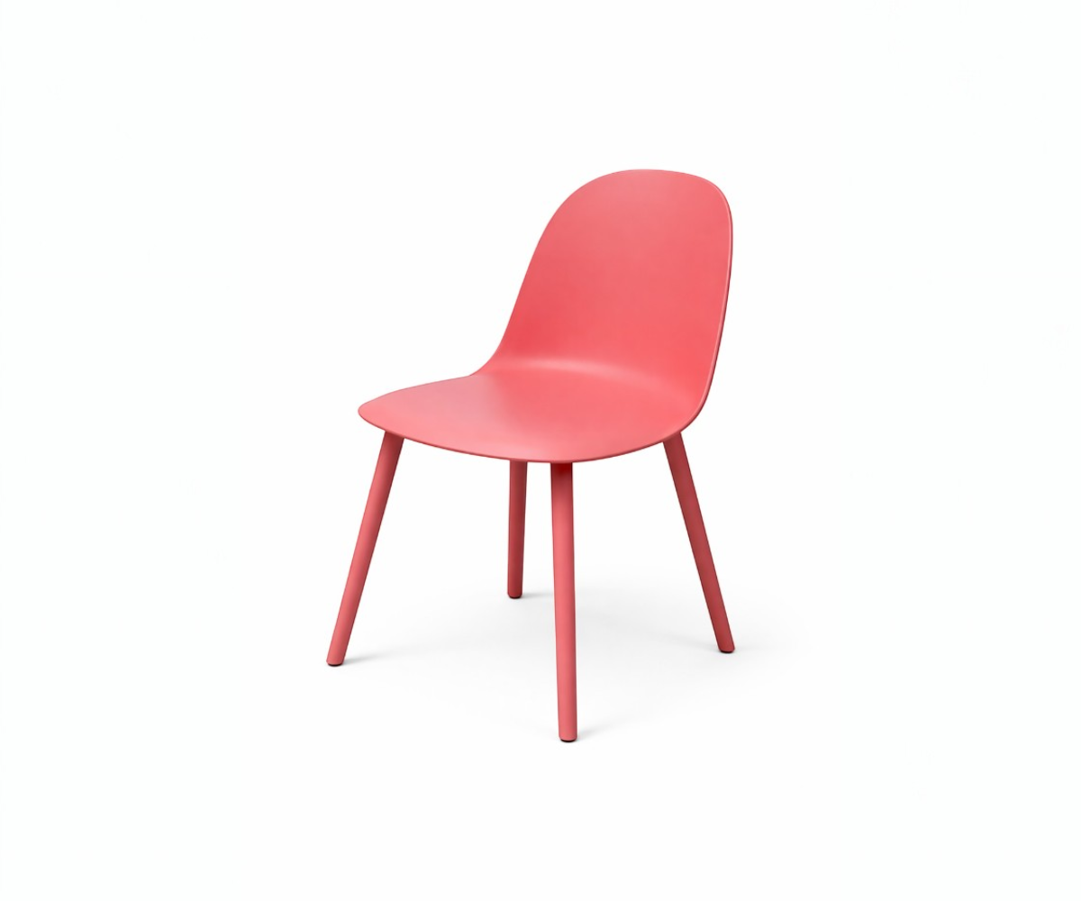 Premium red dining chair, angled view of a moulded coral shell on slim legs