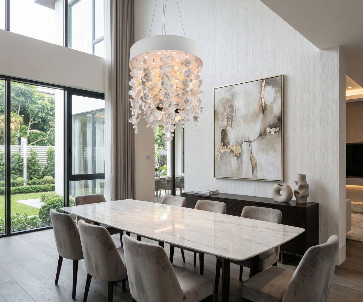 Qatar LED Petal Rain fixture above a marble dining table in a garden-view room
