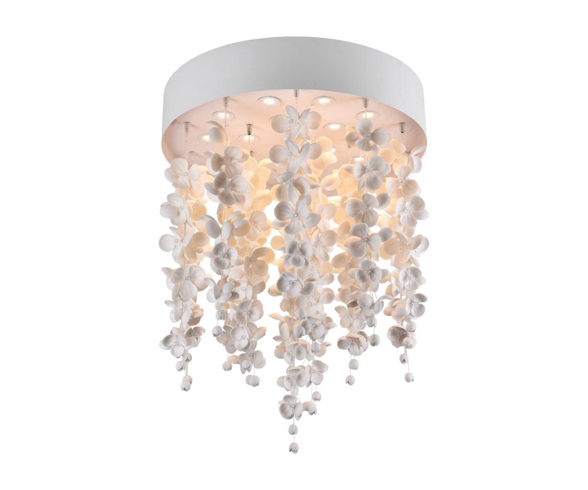 Qatar LED Petal Rain fixture above a marble dining table in a garden-view room