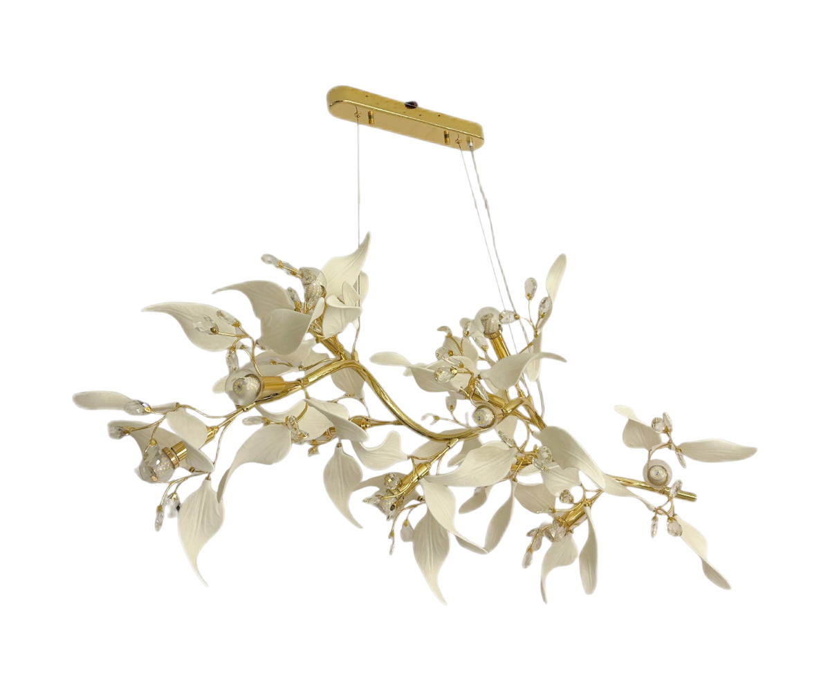 Qatar Lighting Butterfly chandelier above a dining table beside a round mirror