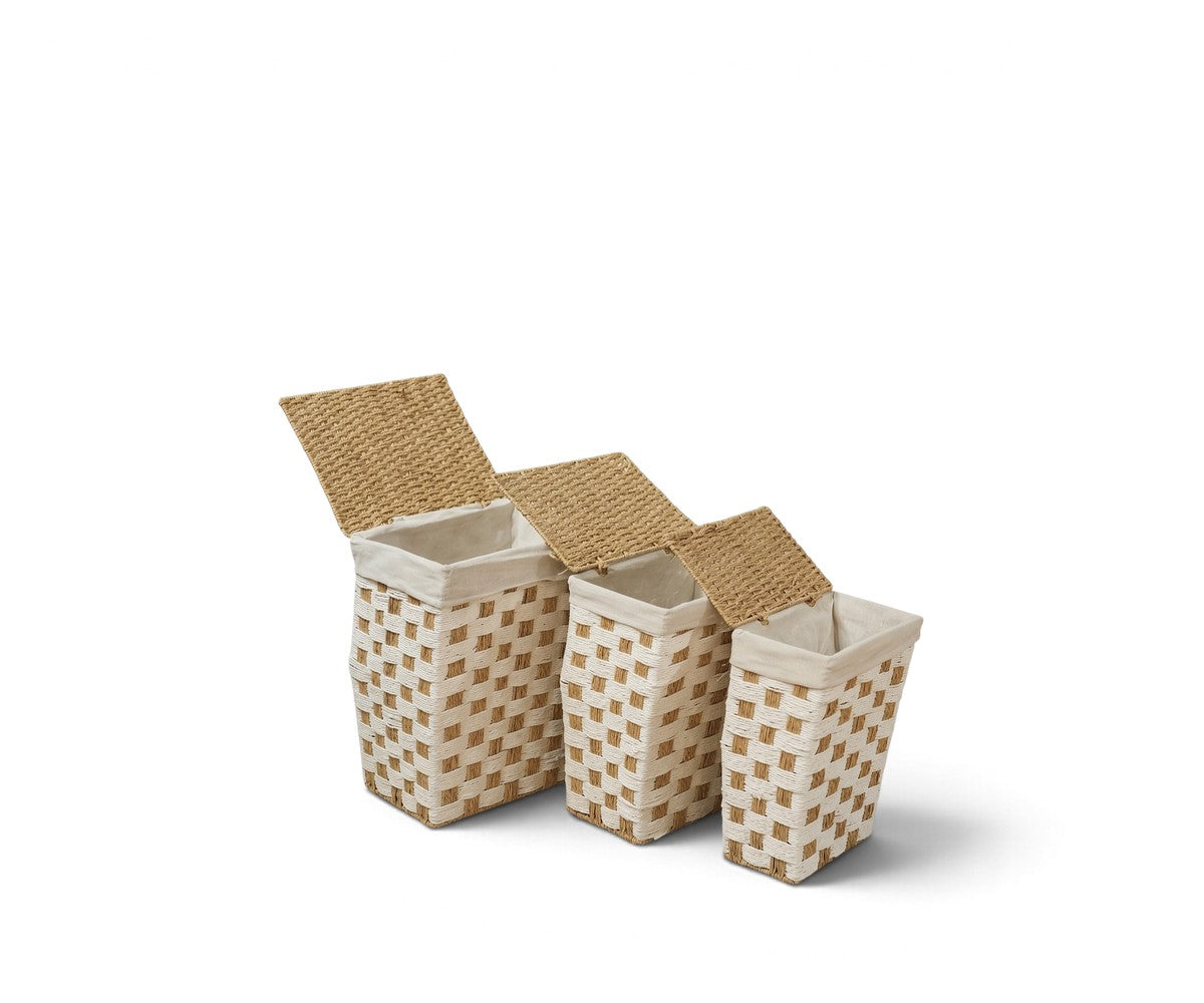 Set of 3 two-tone cream and tan woven storage baskets with open flip-top lids in graduated sizes  