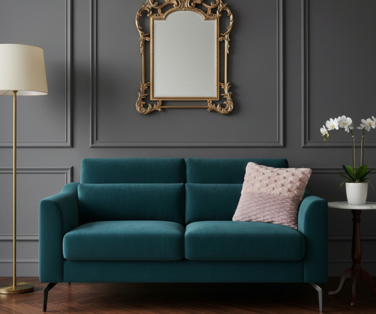 Rose textured duo cushion cover on a teal sofa in a grey panelled room