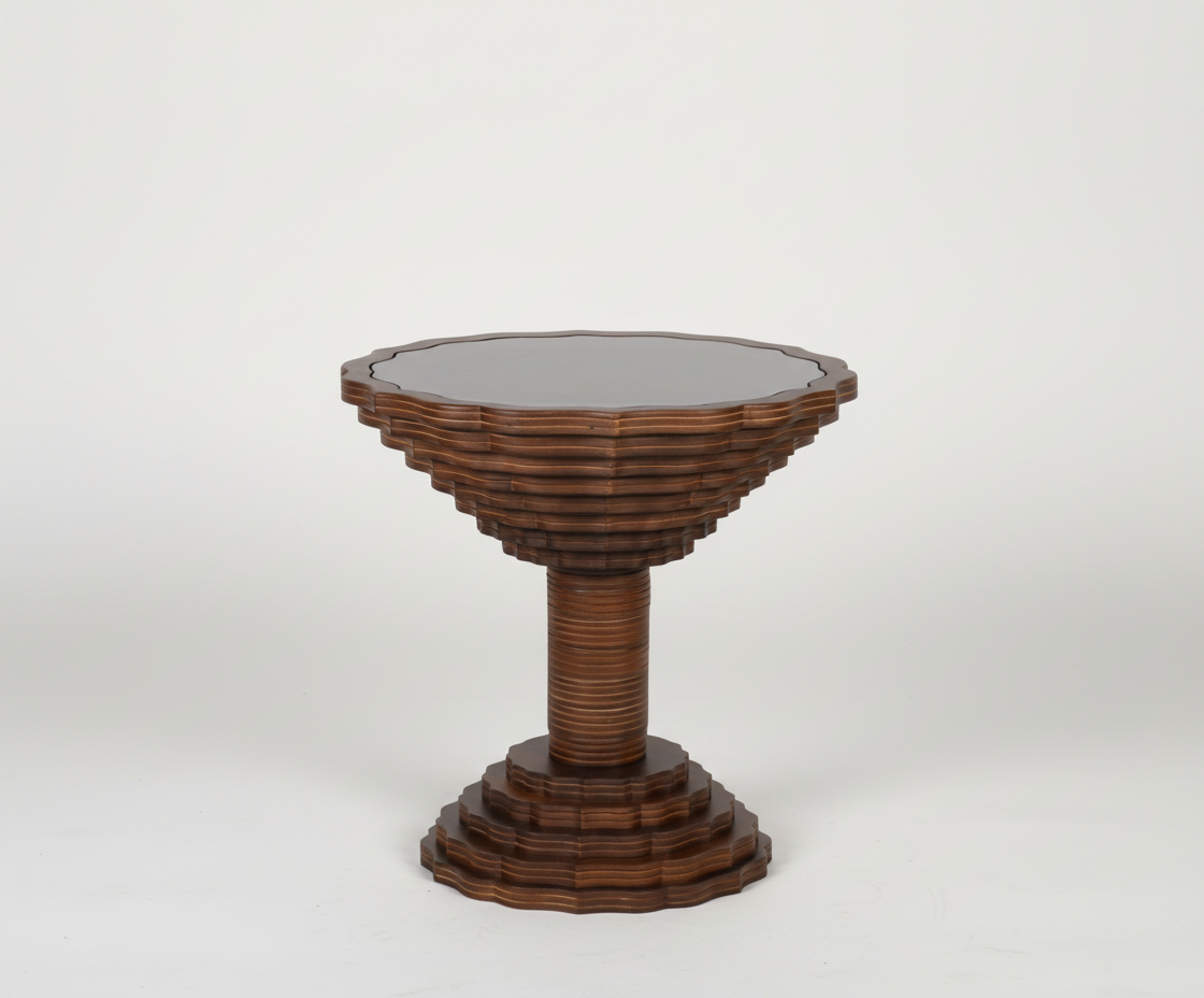 Selena round walnut table, front view with a scalloped stepped pedestal