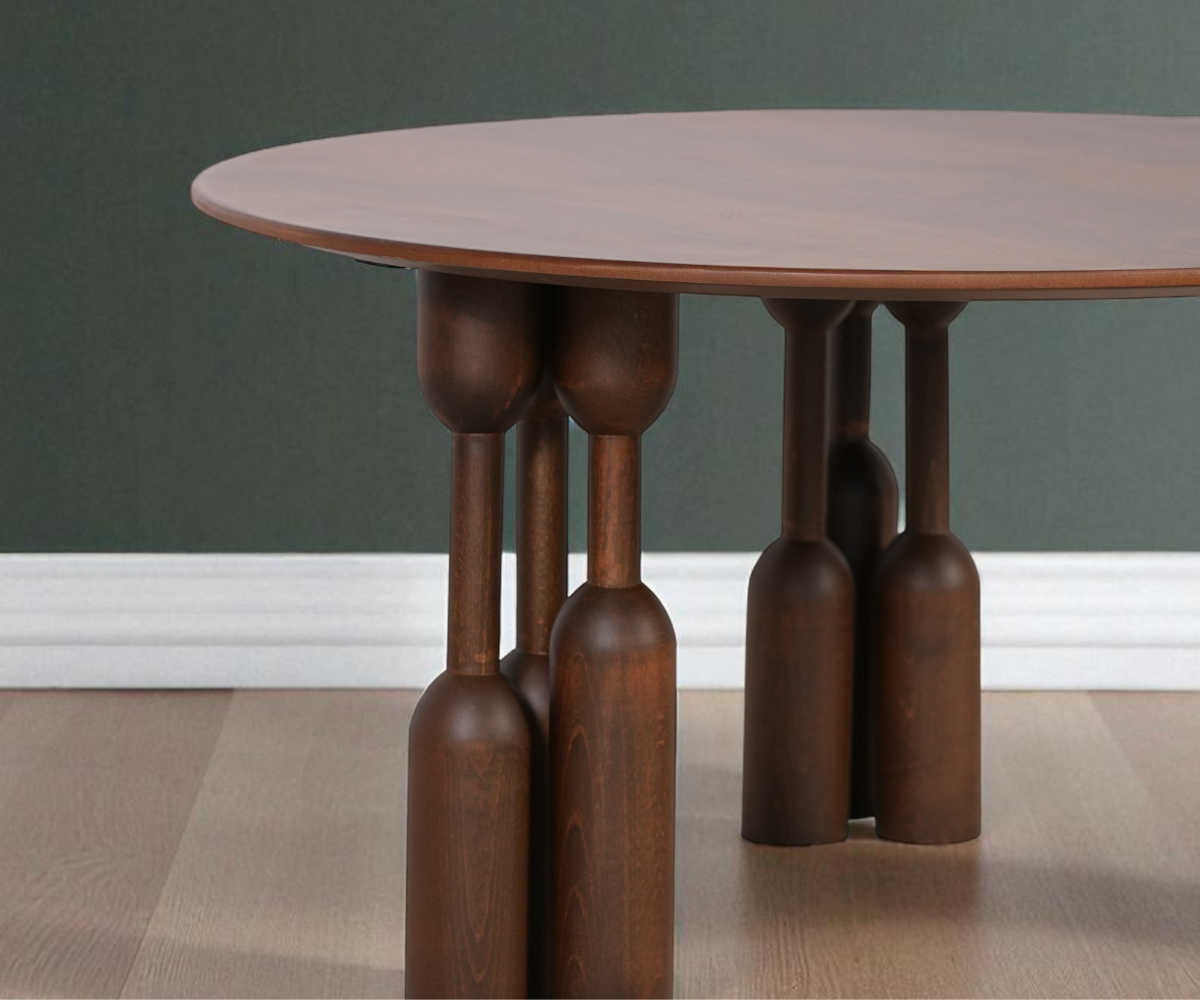 Sena round walnut table in a bright minimal living room