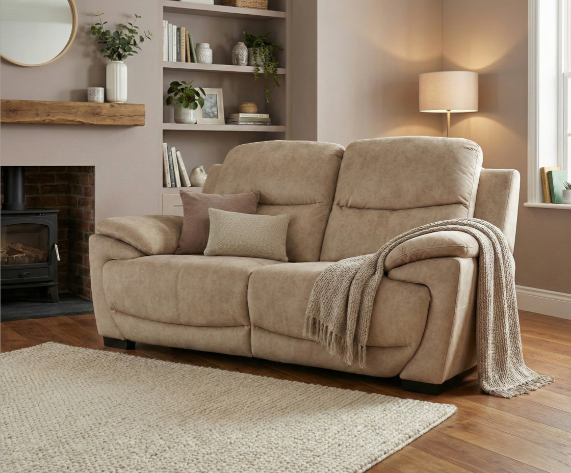SON3RE+2RE beige recliner sofa beside a wood-burner in an alcoved living room