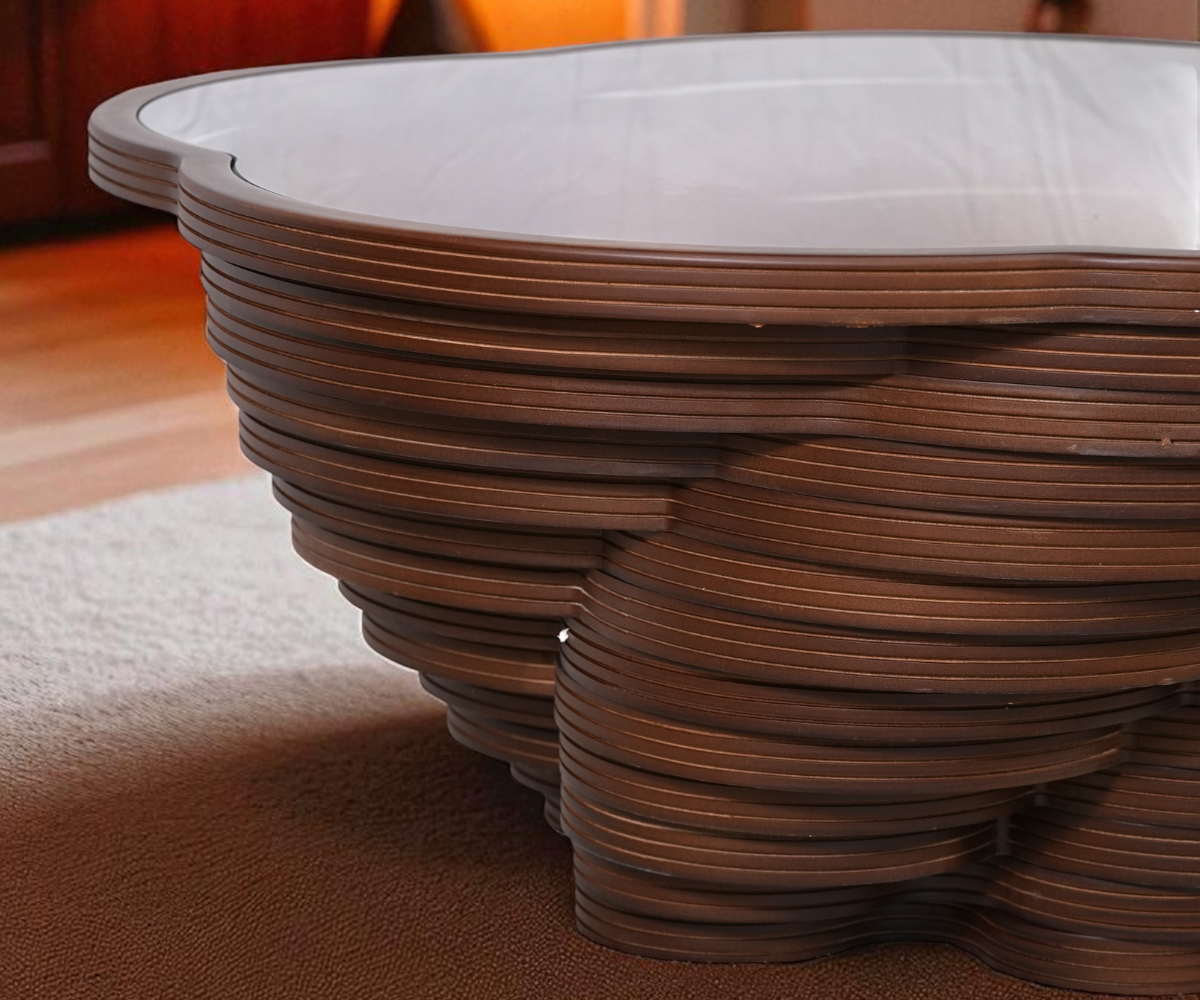 Sultan round walnut table in a bright city-view living room