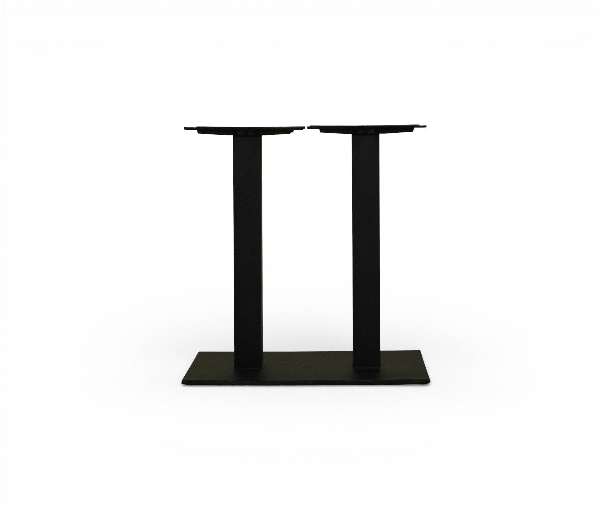TITAN matte black double pedestal table base under a walnut restaurant table