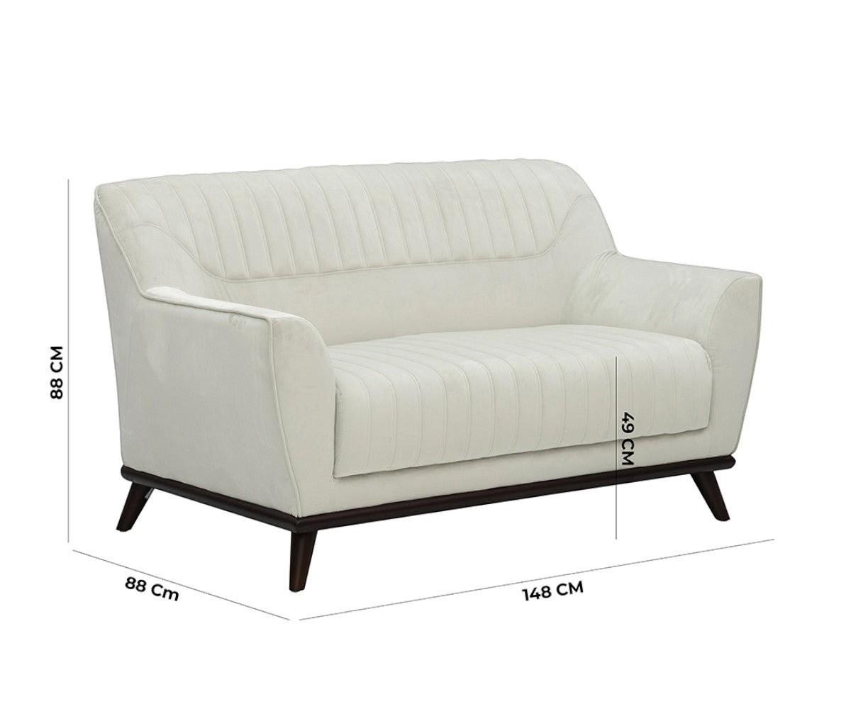 Troop white channel sofa set in a bright pool-view living room