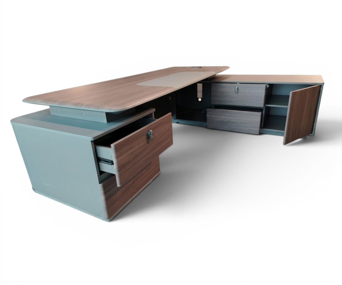 V9-026A executive L-shaped desk in a city-view office at sunset