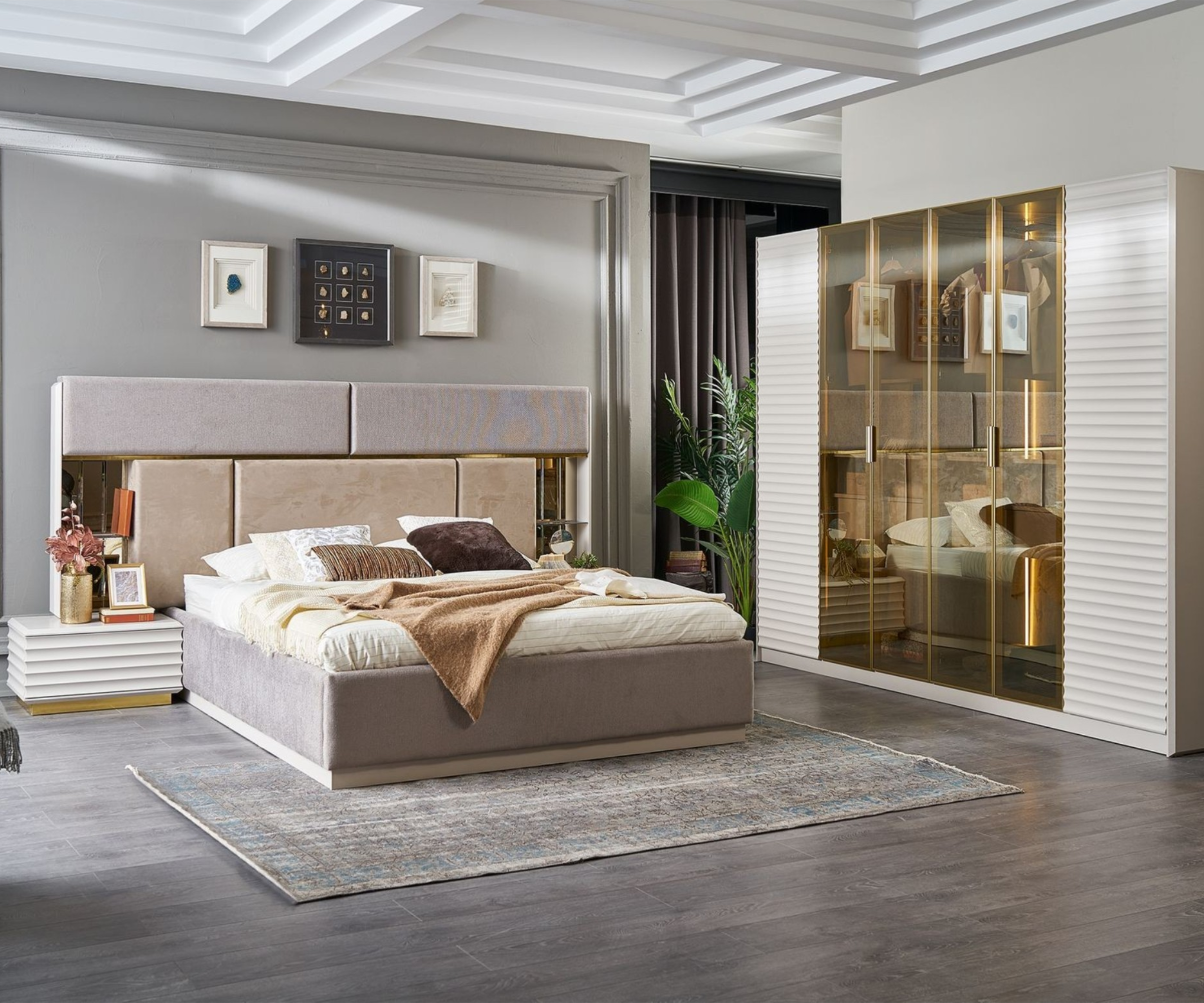 VERONA upholstered bedroom set staged in a room with a lit gold wardrobe